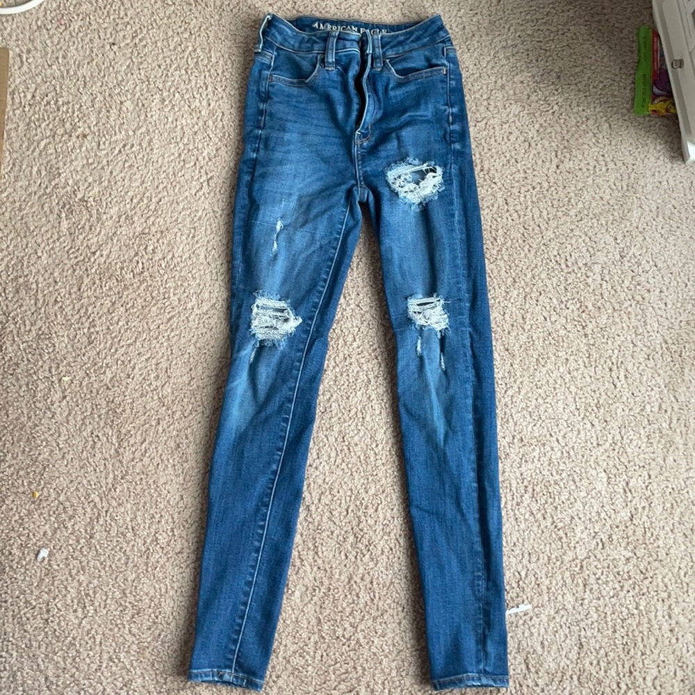Blue ripped skinny jeans